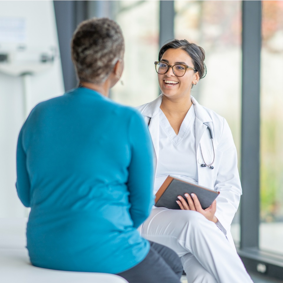 adults riding bicycle